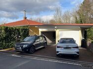 Freistehendes Einfamilienhaus mit Einliegerwohnung in Erlangen-Bruck - Erlangen