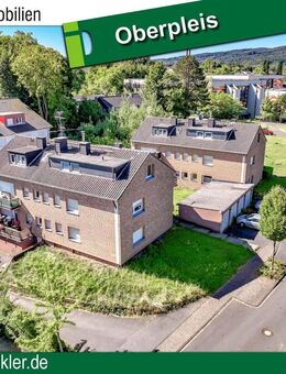 Oberpleis: 2 Mehrfamilienhäuser mit insg. 12 Wohnungen und 8 Garagen - Königswinter