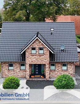Junges, top modernes Einfamilienhaus mit Garage und großzügigem Grundstück - Holtland
