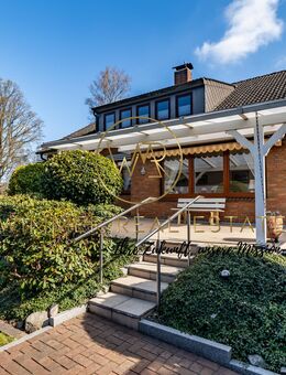 Einfamilienhaus mit Einliegerwohnung, Balkon, Loggia, Terrasse, Vollkeller und großem Potenzial - Grasberg