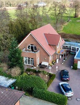 Attraktive Erdgeschosswohnung mit Garten, Terrasse und Garage in einem gepflegten Zweifamilienhaus - Saterland