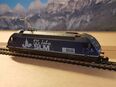 Spur N, Minitrix PROFI 12699: E-Lok BLS Re 465 001 "Simplon / 125 Jahre SLM" in 3006