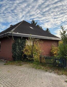 Walmdachbungalow mit Einliegerwohnung in Apen-Roggenmoor - attraktiv vermietete Kapitalanlage - Apen
