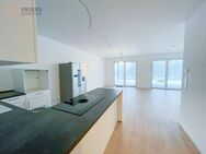 Moderne Neubauwohnung mit Terrasse, Einbauküche und zwei Stellplätzen - Klausen