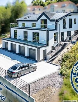 Erstbezug: Moderne Neubau-Eigentumswohnung mit 2 Garagen in Daun-Pützborn - Daun