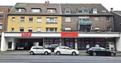 Voll vermietetes Wohn- und Geschäftshaus mit Stellplätzen und Garagen