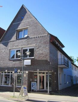 Mehrfamilienhaus mit Gewerbeeinheit und Baugrundstück in Wildeshausen - Wildeshausen