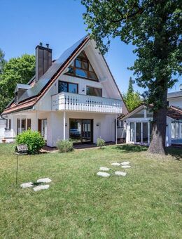 AIGNER - Charmante Doppelhaushälfte mit Gartenparadies in begehrter Lage von Gräfelfing - Gräfelfing