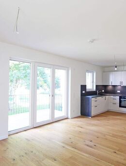 Familientraum mit allen Extras: hochwertige Designwohnung mit EBK, TG/Wallbox und Balkon! - Königs Wusterhausen