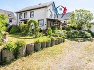 Freistehendes Einfamilienhaus in Wallscheid - besonderes Grundstück, Garten, Veranda & Terrasse - Wallscheid