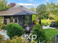 Nachhaltiger Luxus auf höchstem Niveau - Designvilla mit Schwimmkanal, PV & Traumgarten - Höchberg