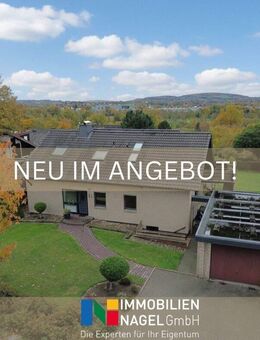 Wohnen mit Komfort und Freiraum - charmantes Zweifamilienhaus in gepflegter Lage - Bad Oeynhausen