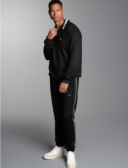 Trigema Freizeitanzug TRIGEMA Jogginganzug mit kontrastfarbigen Akzenten (1-tlg)