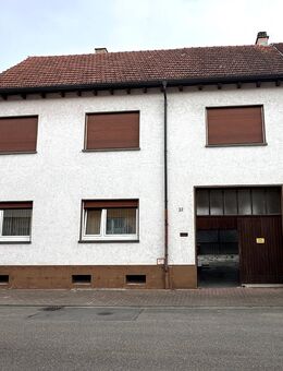 Solides Mehrfamilien Haus mit großem Grundstück - Hockenheim