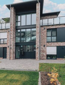 Neue Penthousewohnung mit 100m2 Dachterrasse; Fahrstuhl in die Wohnung und Energieeffizienzklasse A - Lütjenburg