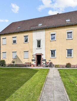 Top sanierte 3,5 Zimmer-Wohnung mit traumhaften Gartenanteil und Garage in Sande-Neufeld II - Sande