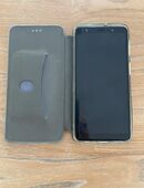 Ich biete ein gebrauchtes Samsung Galaxy A7 mit Umschlaghülle in 47228