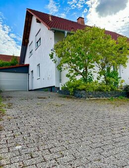 Einzigartiges Einfamilienhaus mit Einliegerwohnung in Nieste - Nieste