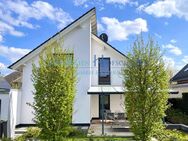 K 497 - MODERN - ZEITLOS - STILVOLL - Junges Einfamilienhaus mit Doppelpultdach und Garage auf parkähnlichem Grundstück! - Bedburg