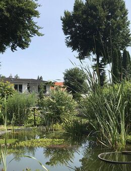 Sonniges Haus mit großer ELW auf Parkgrund - München