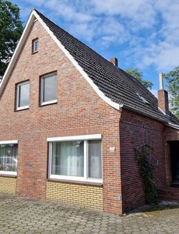 Wohnhaus mit 3 Garagen und großem Grundstück! - Uplengen