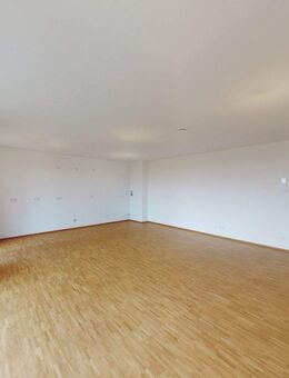 Ein Neubau für das Leben im Quartier mit großzügigem Wohnbereich und Balkon - München