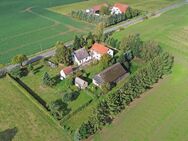 Idyllisches Landhaus mit 4 Wohnungen, Scheune und Garage auf großzügigem Grundstück - Rubkow