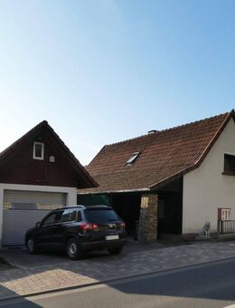 AUMÜLLER-Immobilien - Sympathisches Einfamilienhaus mit großer Garage und sonniger Terrasse - Bad Soden-Salmünster