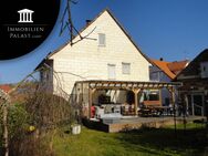 1 Familienhaus für 2 Familien mit Garten und Wintergarten, Werkstatt und Garage - Alheim