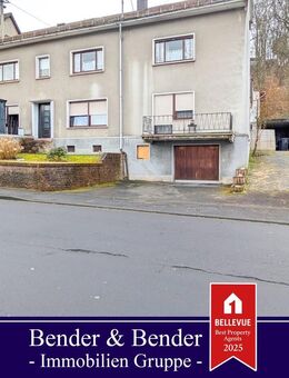 Solide Kapitalanlage: Mehrfamilienhaus mit 4 Wohneinheiten, Garagen und Garten! - Betzdorf