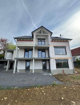 Erstbezug: 3 moderne 3-Zimmer-Wohnungen mit jeweils großzügiger Terrasse oder Balkon - Poppenhausen