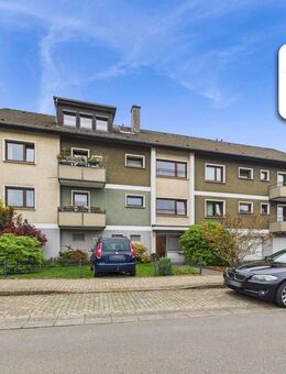 SCHADE IMMOBILIEN - Bezugsfreie 2-Zimmerwohnung mit Balkon und Gartenmitbenutzung zu verkaufen! - Lüdenscheid