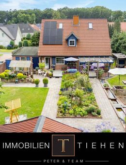 Modern aufgeladen: Einfamilienhaus mit 2 PV-Anlagen, neuer Wärmepumpe und Freiluftwohnzimmer - Lähden