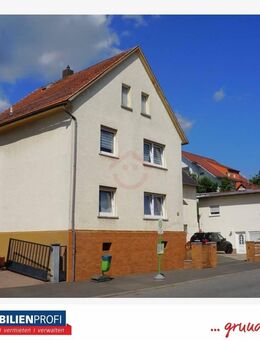 Modernisiertes Einfamilienhaus mit vermietetem Nebengebäude auch als Mehrgenerationenhaus nutzbar - Biebertal
