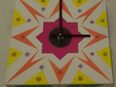 Bunte Wanduhr in 76829