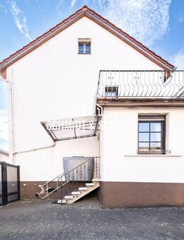 Charmantes Einfamilienhaus mit großem Grundstück und Potenzial - Kronau