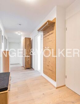 Moderne 4-Zimmer-Wohnung mit Garage und Sondernutzungsrecht für das Dach - Feucht