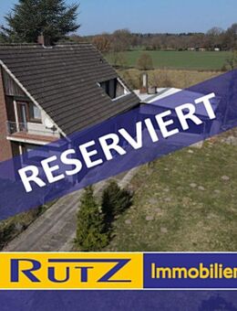 Ganderkesee-Falkenburg | Einfamilienhaus mit Garagenanbau und Vollkeller - Ganderkesee