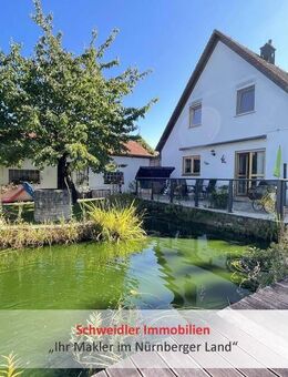 Wie ein Haus am See: Einfamilienhaus (Bj. 1993) mit Traumgarten und Garage in Lauf-Kuhnhof - Lauf (Pegnitz)