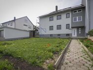 Charmante 4-Zimmerwohnung im ersten Obergeschoss mit Balkon und Gartenanteil - Dittelbrunn