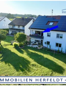 Exklusive Kapitalanlage: Stilvolle 3-Zimmer-Wohnung mit Südbalkon, Garten, Garage & Stellplätzen - Gablingen