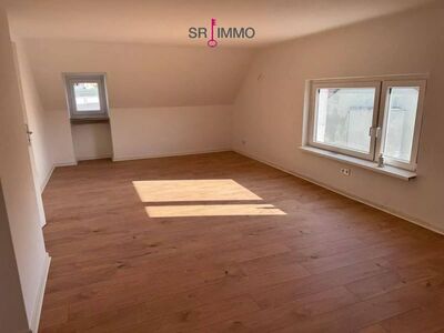 Renovierte Dachgeschosswohnung in einem gepflegten Mehrfamilienhaus