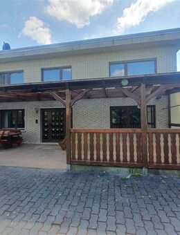 Einfamilienhaus mit ausgebautem Nebengebäude und großem Grundstück - Raubach
