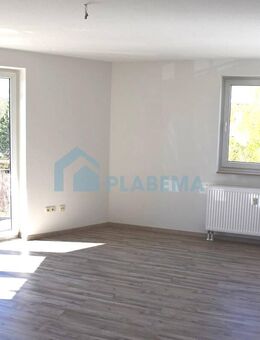 4-Zimmer-Wohnung mit Balkon, Einbauküche, wohnlichen Räumen im Souterrain & Stellplatzoption - Parchim