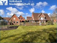 Einfamilienhaus mit großem Grundstück in schöner Ortsrandlage - Georgsdorf