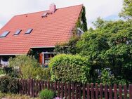 Wohnung mit Haus Charakter mit traumhaften Garten, Garage, Einbauküche und Fußbodenheizung - Erlangen