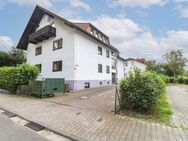 Wohnen mit Grün: Familienfreundliche Souterrainwohnung mit eigener Terrasse und Gemeinschaftsgarten - Altenstadt (Hessen)