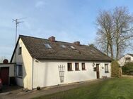 Älteres Einfamilienhaus mit Garage auf schönem Grundstück in Haselau - Haselau