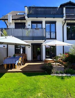 Exklusives Wohnen auf zwei Ebenen - familienfreundliche Gartenwohnung in Trudering - München