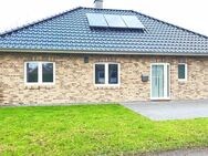 Zentrum! Junger Bungalow, KfW 55 Energie mit Garage, Kaminofen, EBK. Pflegeleichtes Grundstück... - Rhauderfehn